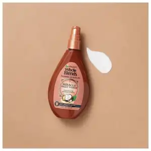 Garnier Whole Blends Taming Leave-In Miracle Frizz Tamer 10-in-1 Coconut Oil & Cocoa Butter 150 mL (5 oz) miniatura 6