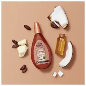 Garnier Whole Blends Taming Leave-In Miracle Frizz Tamer 10-in-1 Coconut Oil & Cocoa Butter 150 mL (5 oz) miniatura 8